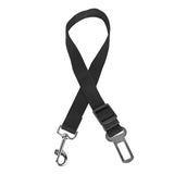 Black dog leash with clip and carabiner on a white background