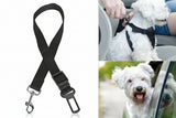 Black pet seat belt with a car seat belt clip, used to secure a dog in a vehicle.