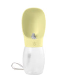 A pet collapsible water bottle and bowl set in pale yellow and translucent white, featuring a wrist strap and a small paw print logo on the yellow collar.