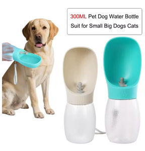 Two 300ML pet water bottles shown on a white background, alongside a yellow Labrador retriever holding a turquoise bowl and a text box stating '300ML Pet Dog Water Bottle Suit for Small Big Dogs Cats'.