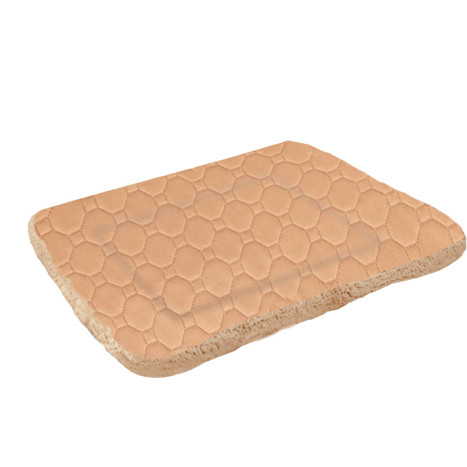 Beige foot pad with honeycomb pattern on a white background