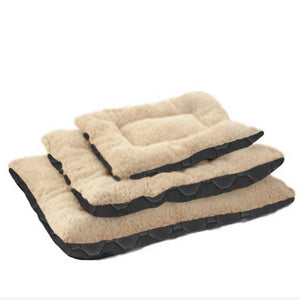 Three sizes of beige pet beds with black borders on a white background