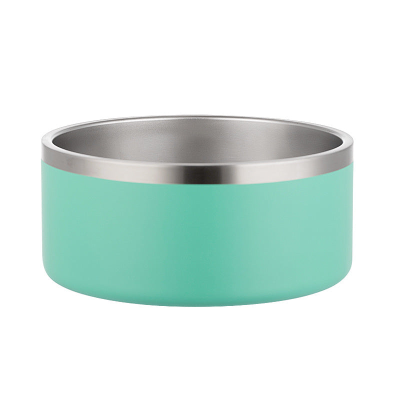 Turquoise dog bowl with silver rim on a white background