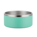 Turquoise dog bowl with silver rim on a white background