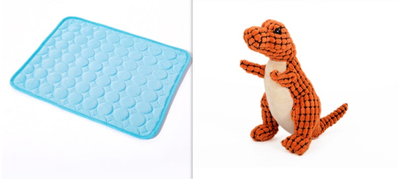 Blue textured mat on the left and orange dinosaur toy on the right.