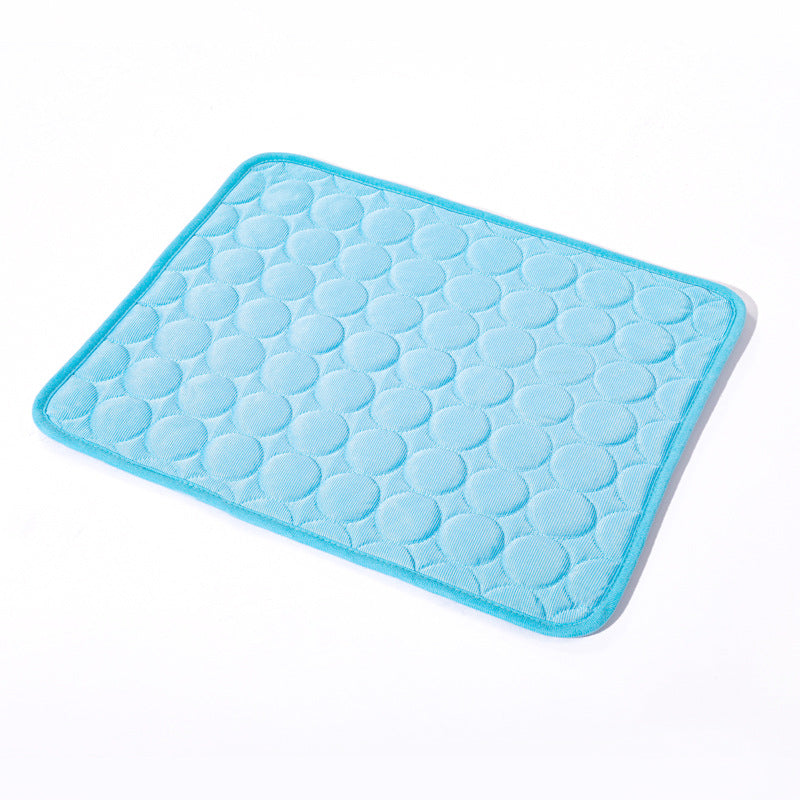 Blue textured bath mat on a white background