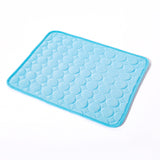 Blue textured bath mat on a white background