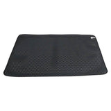 Black perforated mat on a white background