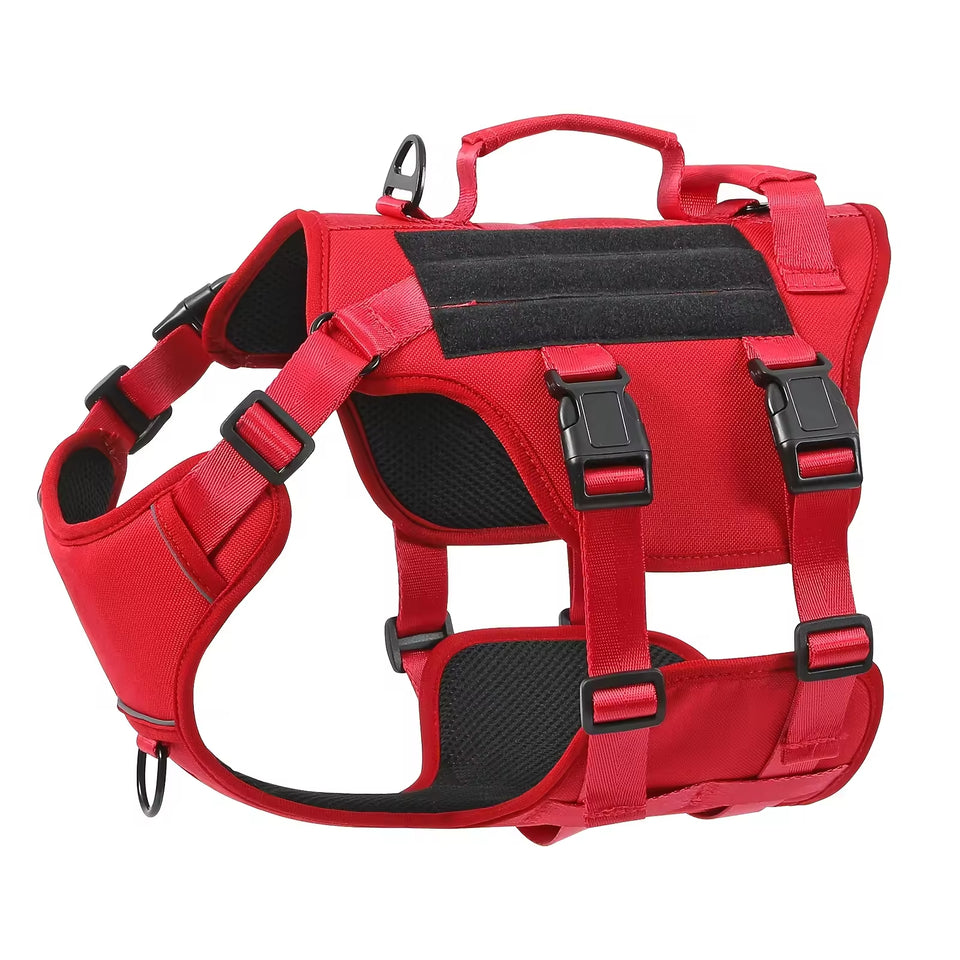 Red dog harness with black padding on a white background