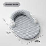 Gray baby pillow with dimensions on a light gray background