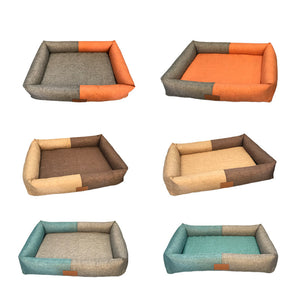 Pet bed with colorful design and plush toy in a room setting