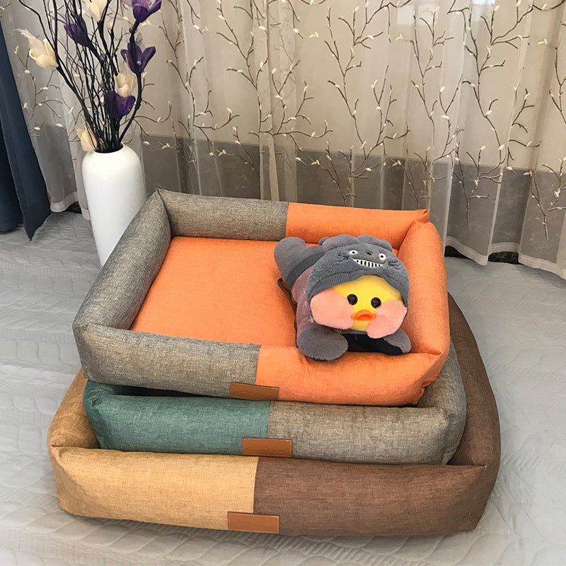 Pet bed with colorful design and plush toy in a room setting
