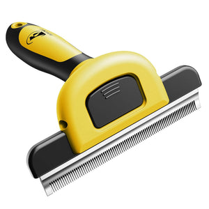 Pet grooming brush with yellow and black handle on a white background
