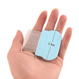 Small blue comb and ruler held in a hand with measurements indicated.
