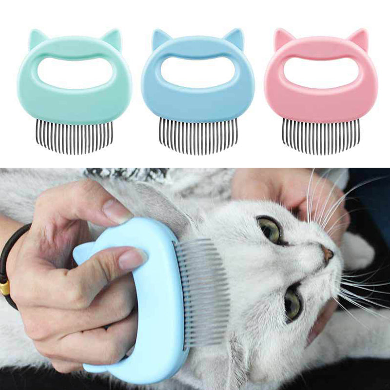 Three pet grooming combs with cat ear handles in blue, green, and pink, with a person using one of them on a cat.