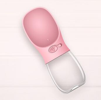 Pink pet water bottle on a white background