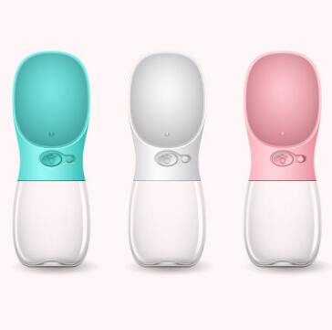 Three pet water bottles in teal, white, and pink on a white background