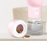 Pink pet water bottle and food container on a light wooden surface with a white background