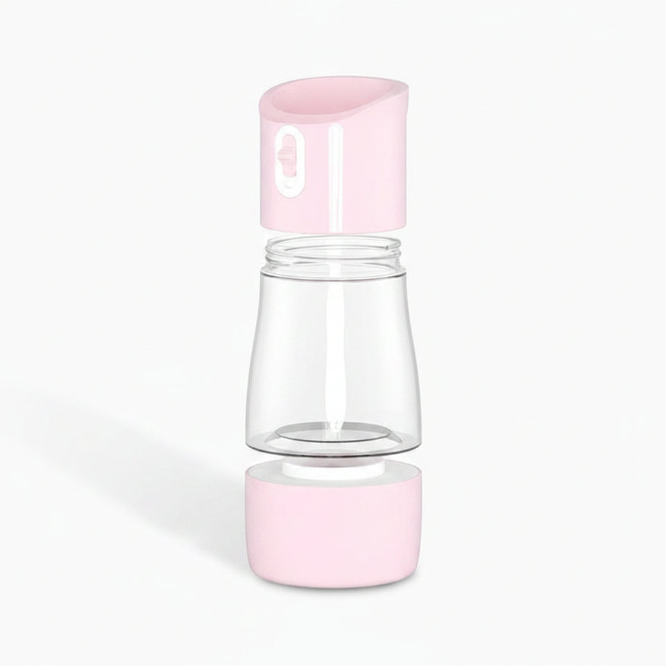 Clear and pink pet water bottle with measurements for water and kibble