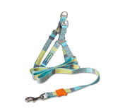 Patterned dog leash with colorful clip on a white background