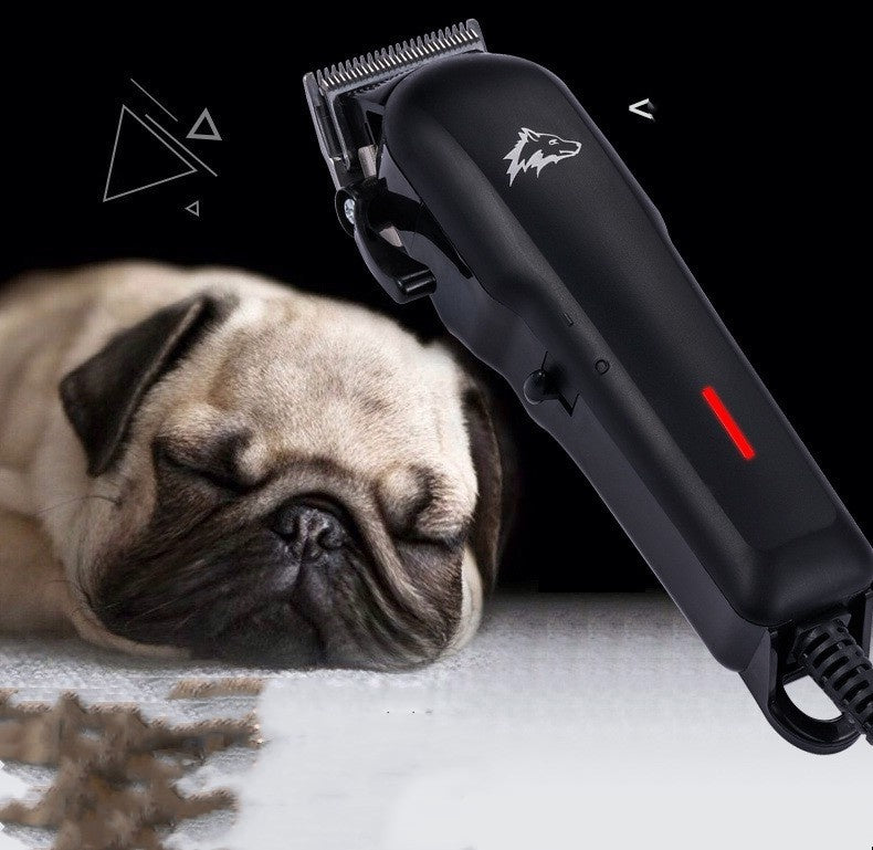 Dog grooming clipper next to a sleeping pug on a black background