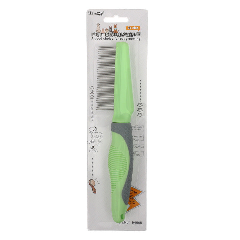 Green pet grooming comb with packaging on a white background