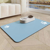 Pet mat with paw prints on a wooden floor in a living room setting.