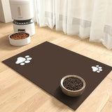 Pet mat with paw prints on a wooden floor with a pet bowl and food dispenser.