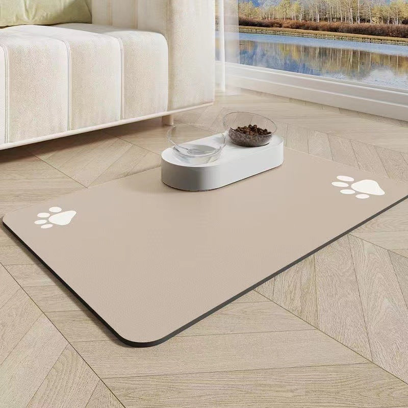 Pet mat with paw prints on a wooden floor in a living room setting.