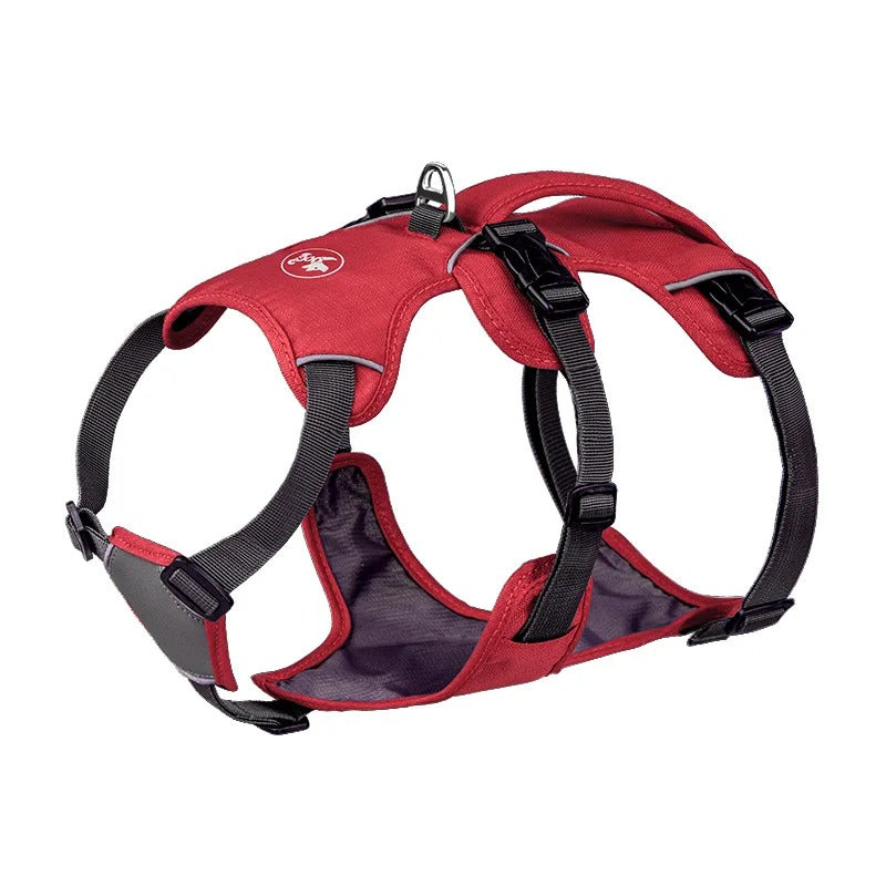 Red dog harness with black straps on a white background