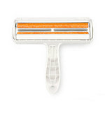 Cleaning roller with orange bristles on a white background