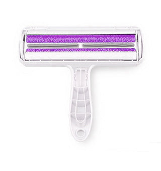 White pet hair removal roller with purple roller on a white background