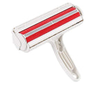 White pet hair remover with red roller on a white background
