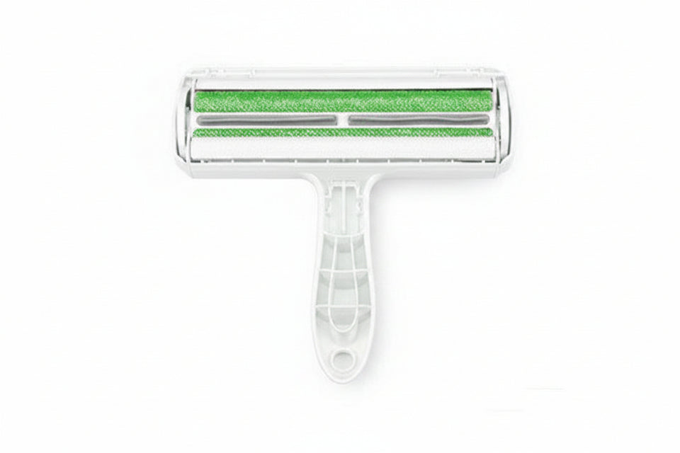 White pet grooming brush with green bristles on a white background