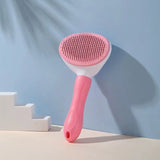 Pink pet grooming brush on a light blue background