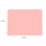 Rectangular pink mat with dimensions 30cm x 40cm on a white background