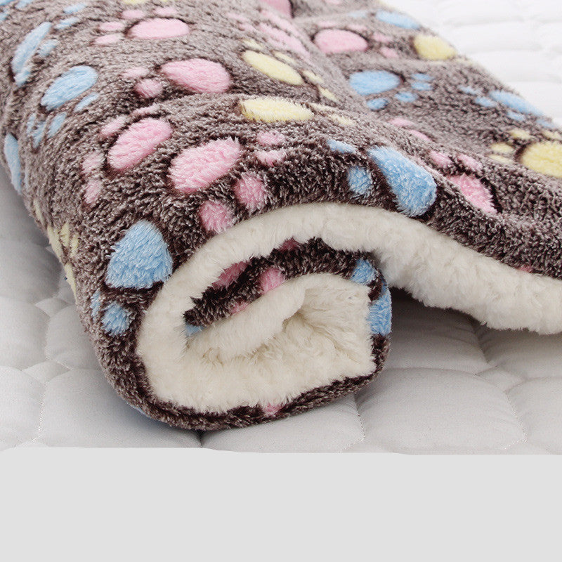 Fluffy blanket with colorful pattern on a white background