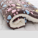 Fluffy blanket with colorful pattern on a white background