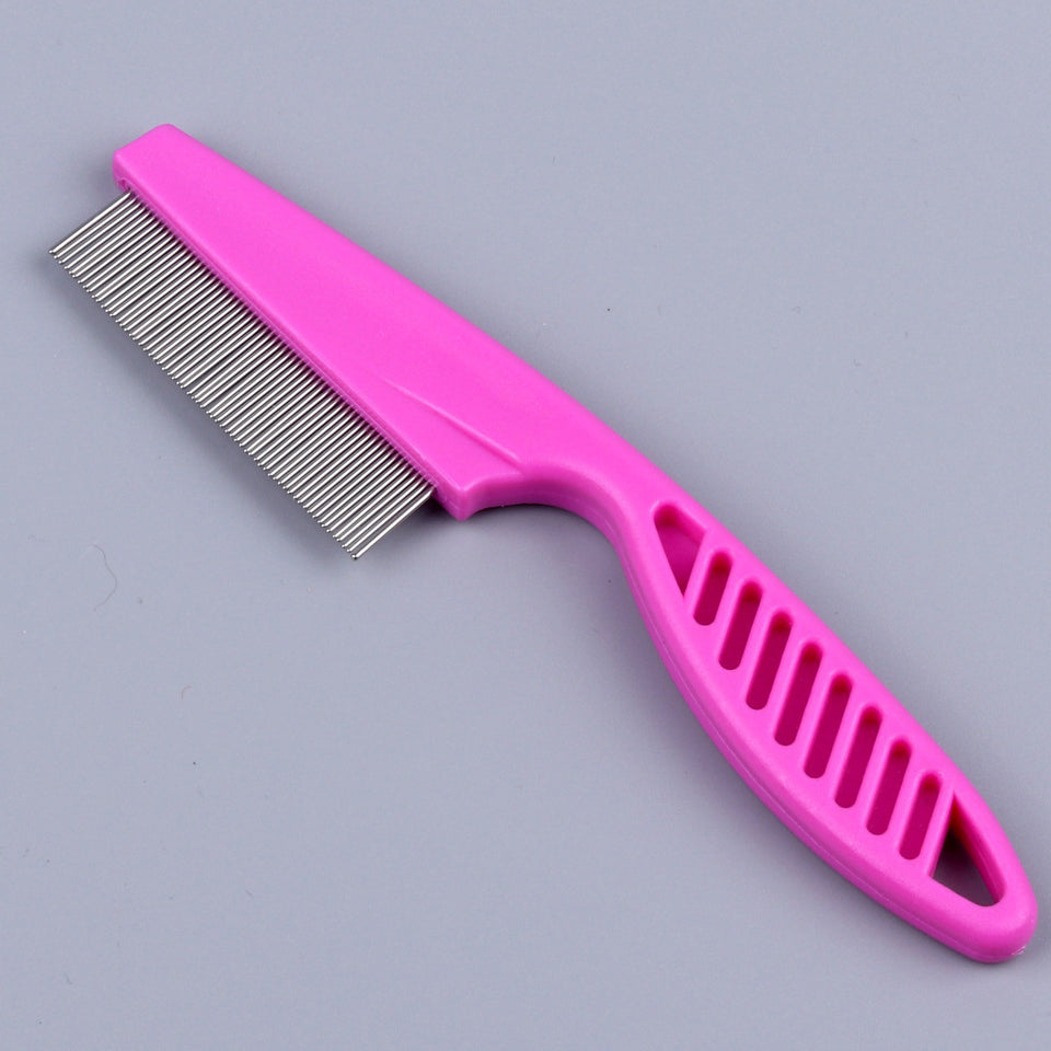 Pink comb with metal teeth on a gray background
