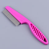 Pink comb with metal teeth on a gray background