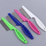 Set of four colorful pet grooming combs on a gray background