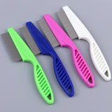 Set of five colorful pet grooming combs on a gray background