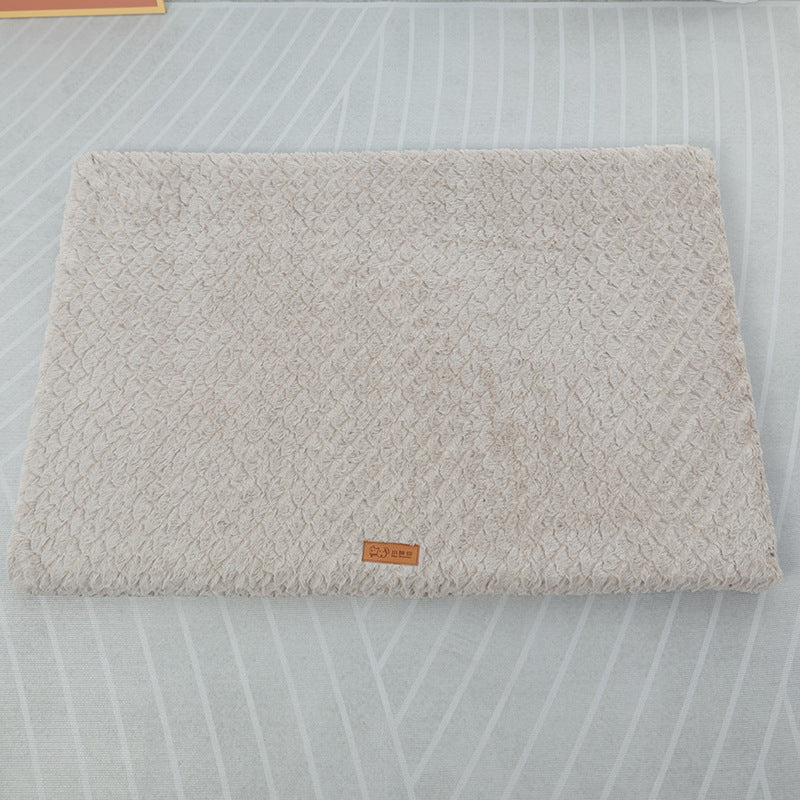 Textured beige rug with a brand label on a transparent background