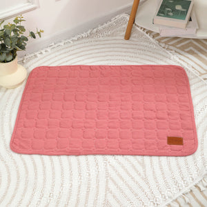 Yellow quilted mat with a brown leather patch on a white background