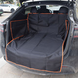 Car trunk with a black and orange pet seat cover