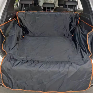 Car trunk with a black and orange pet bench cover