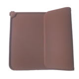 Brown leather case on a white background